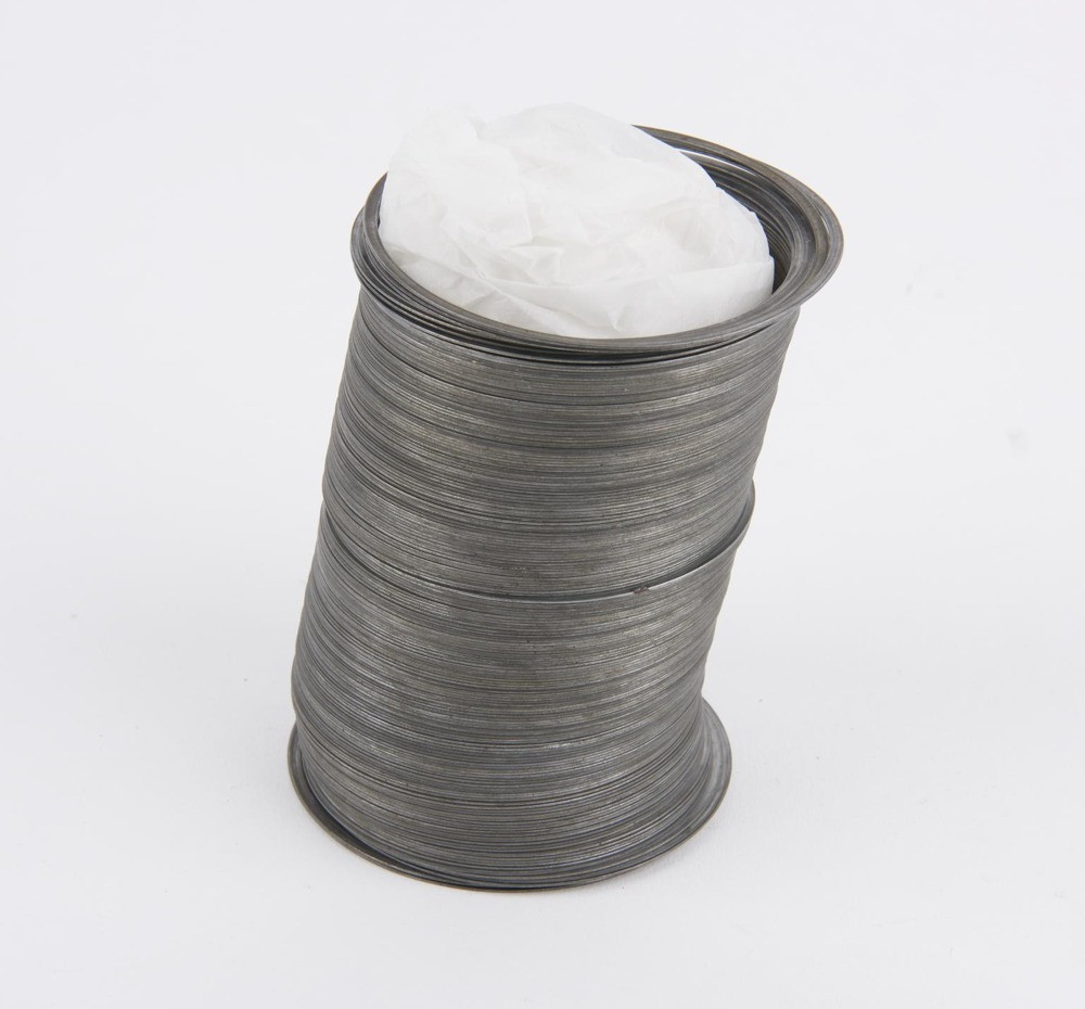 Металлическая игрушка-пружинка Slinky из музейной коллекции